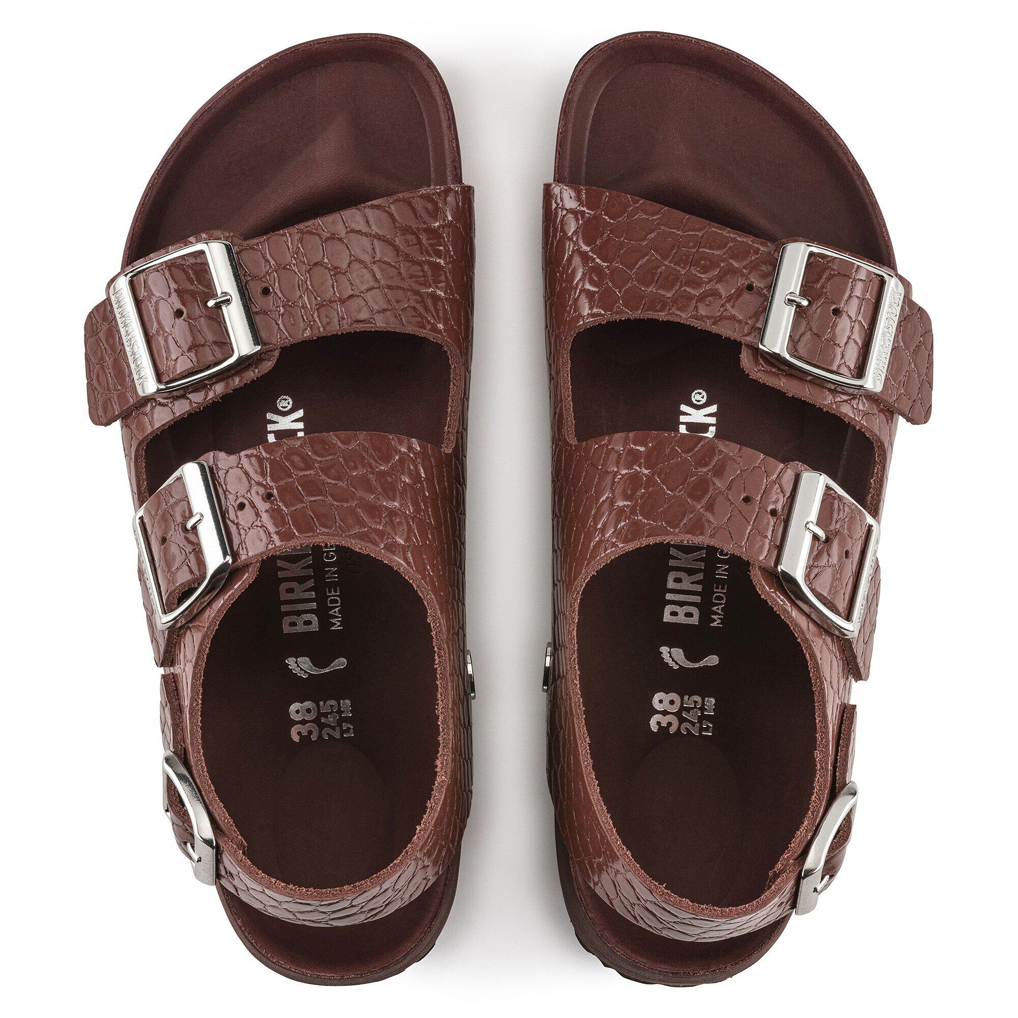 ميلانو ريفيت بمسامير وشعار جلد طبيعي مزخرف