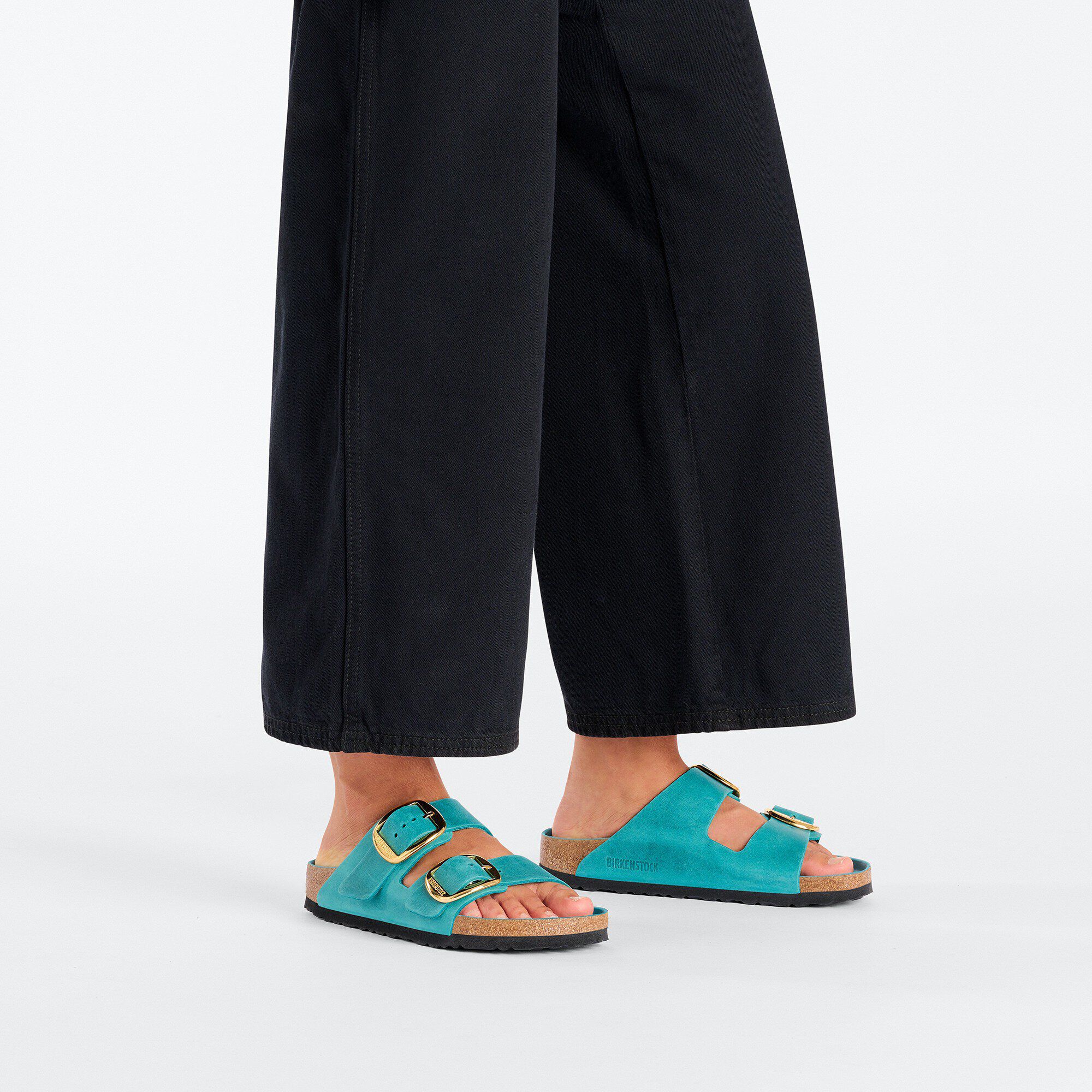 Arizona Big Buckle Natural Leather Oiled with a female model