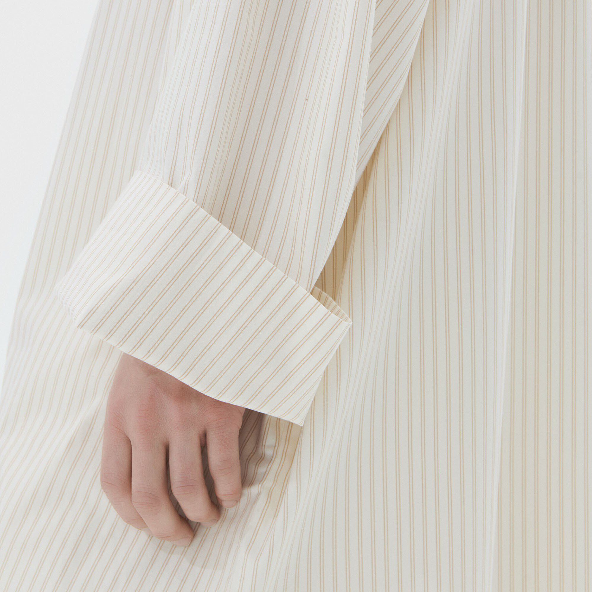 Tekla Kaftan  Close-up view showing material detail