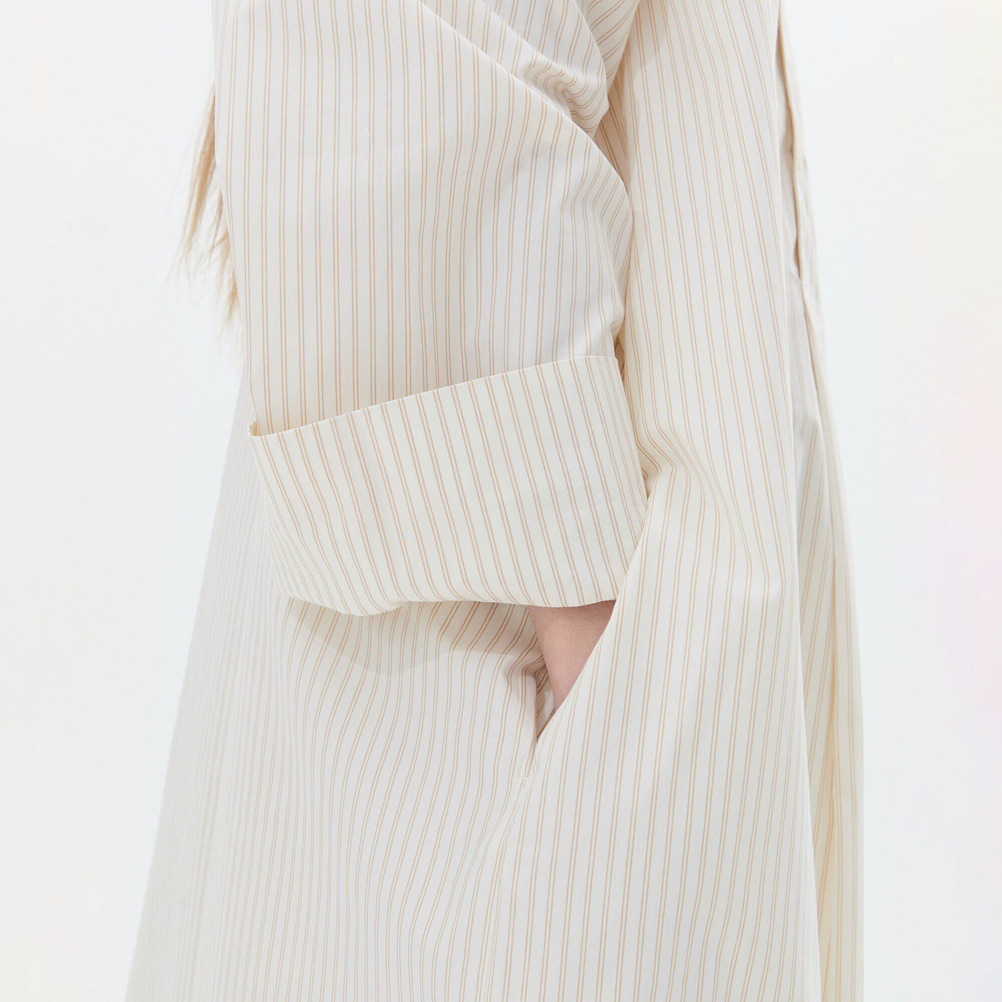 Tekla Kaftan  Close-up view showing material detail