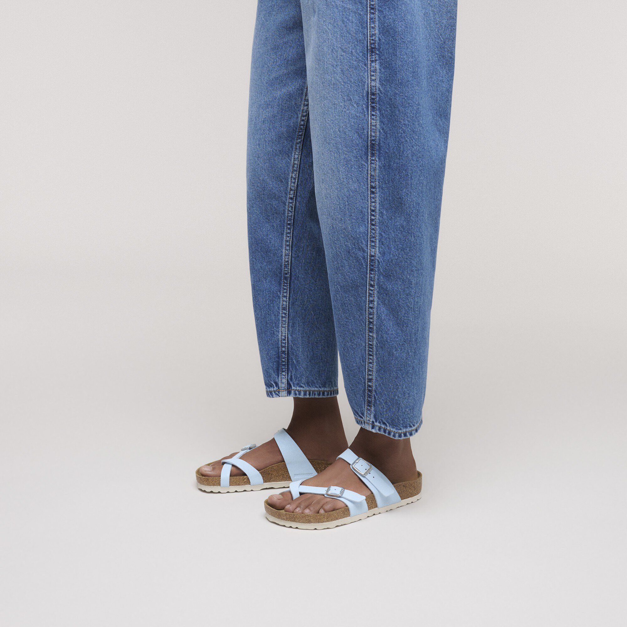 Mayari Birkibuc with a female model